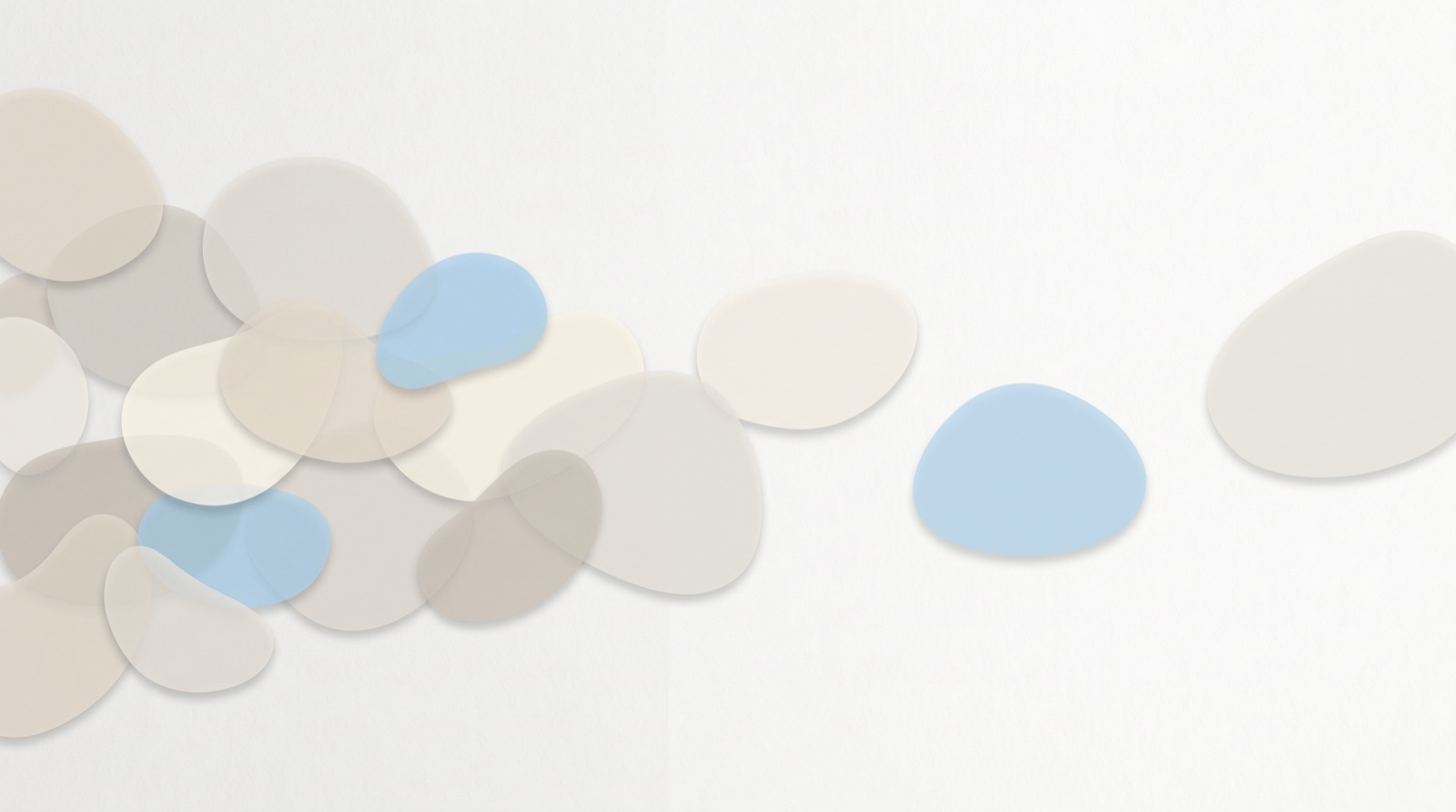 Soft overlapping translucent shapes gathered on the left, easing into a few calm, well-spaced shapes on the right, suggesting a busy mind settling.